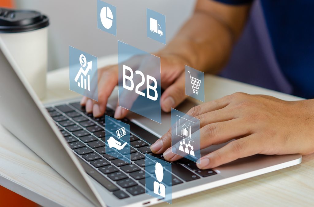 man hand using laptop virtual screen B2B Business to Business ic