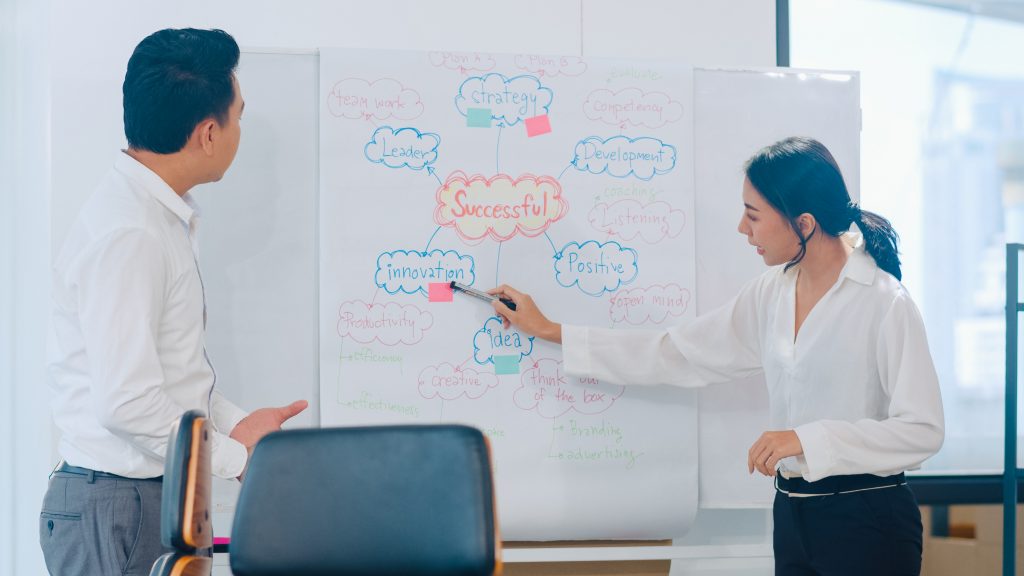 Asia businessmen and businesswomen meeting brainstorming ideas c