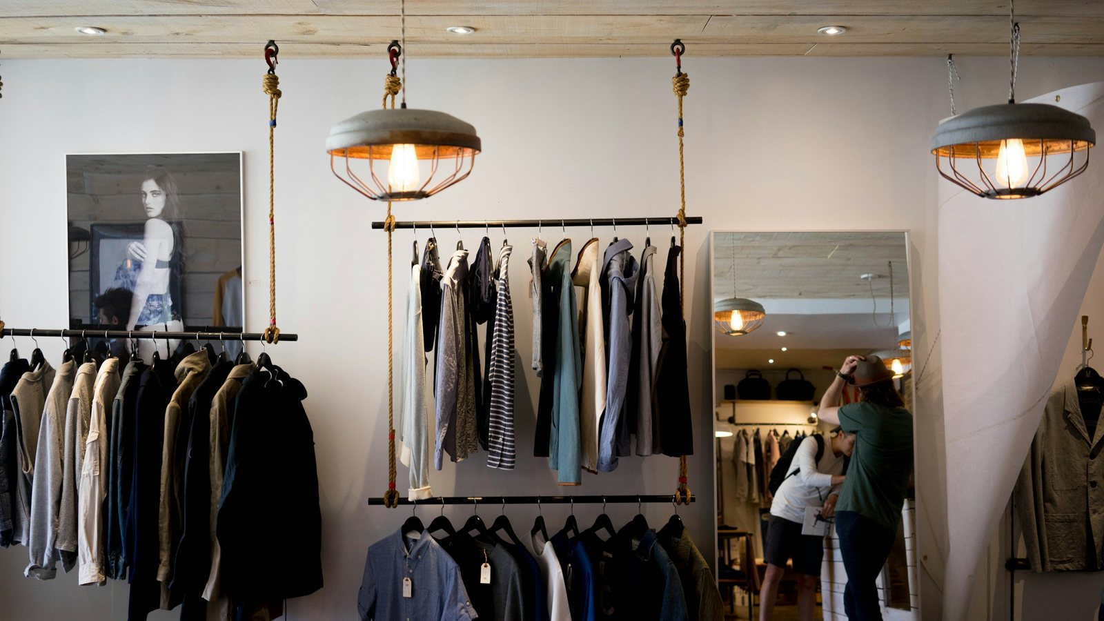 Apparel showroom with hanging racks of a seasonal range, where wholesale buyers place repeat orders