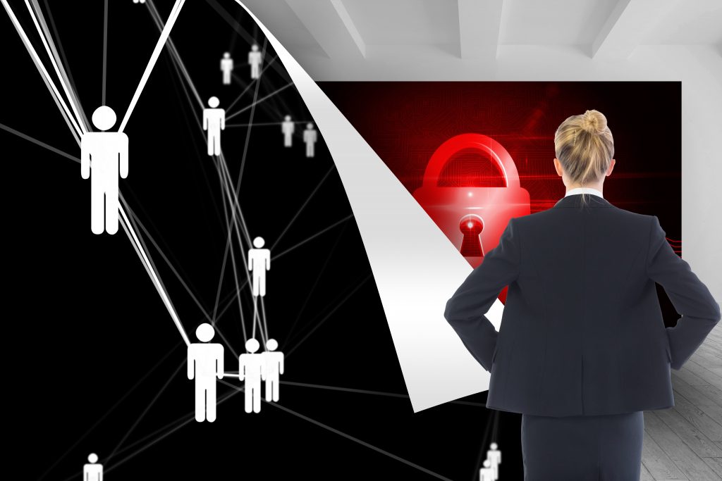 Composite image of blonde businesswoman standing with hands on hips