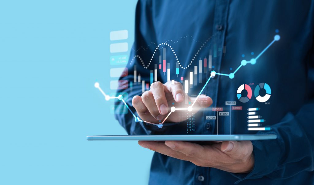Businessman trading online stock market on teblet screen, digita