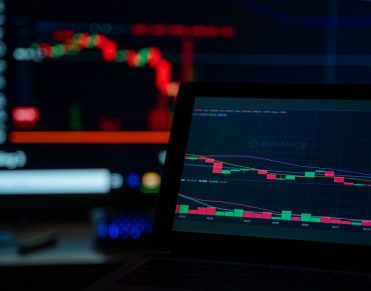 Arcadier and CS-Cart alternatives compared on a dual monitor data dashboard